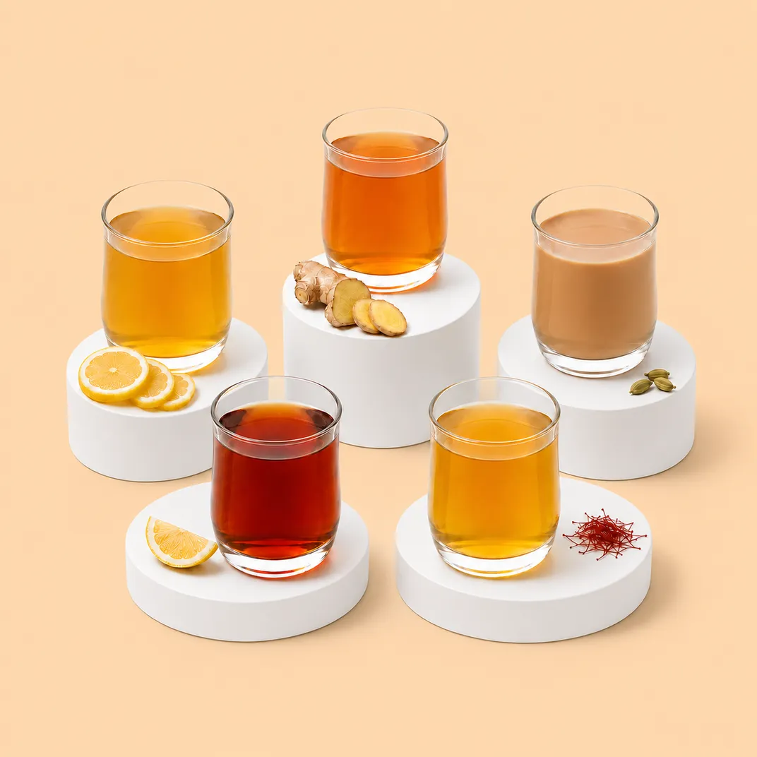 Five Chai Point teas and chais in glasses on white pedestals
